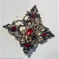 Broche Dorado Cuatro Picos