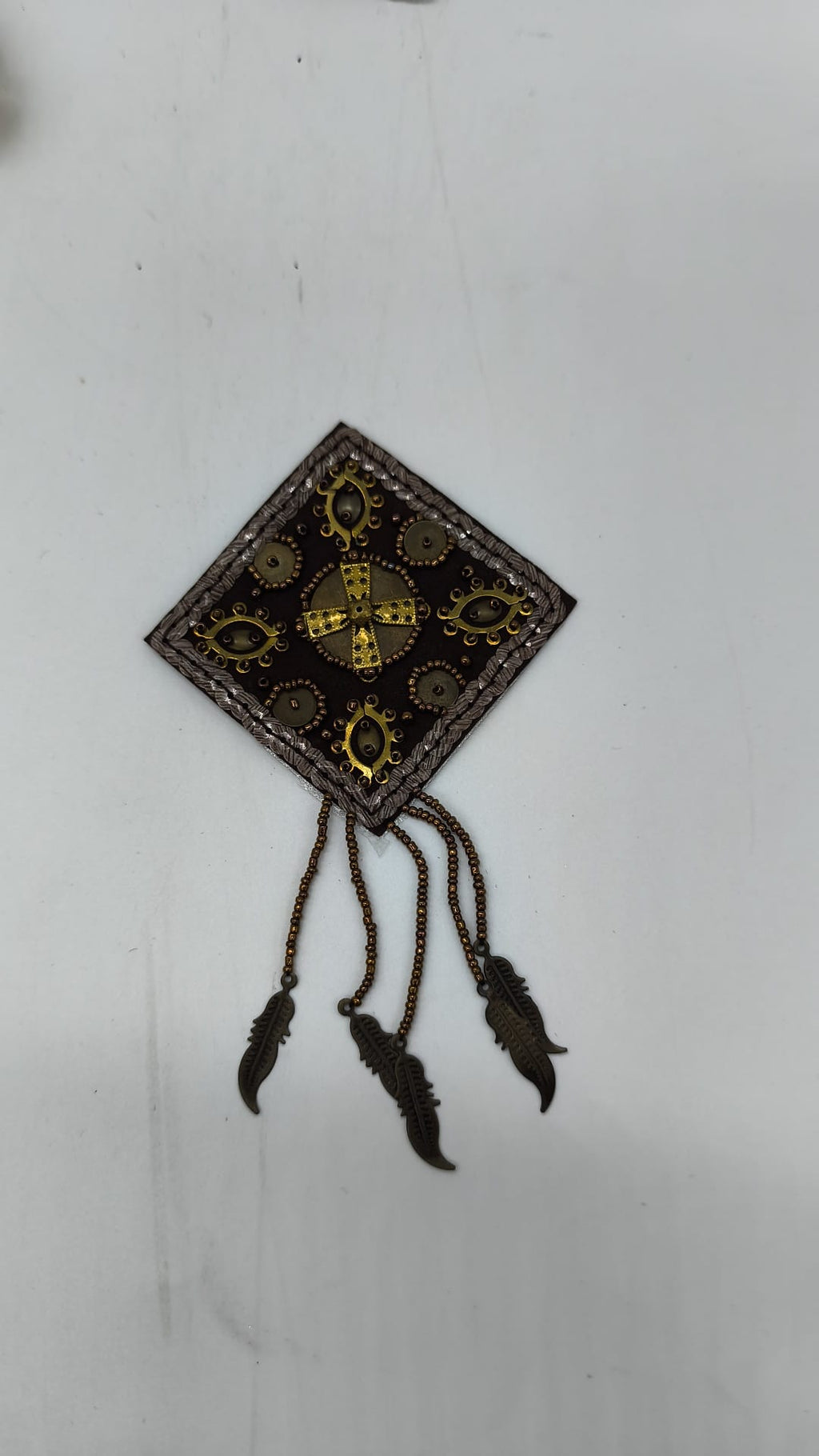 EMBROIDERED APPLIQUE