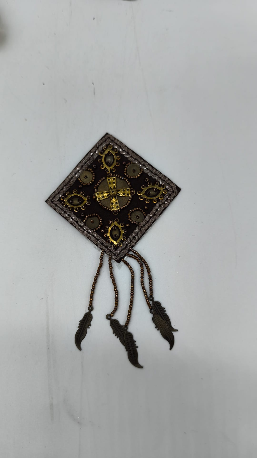EMBROIDERED APPLIQUE